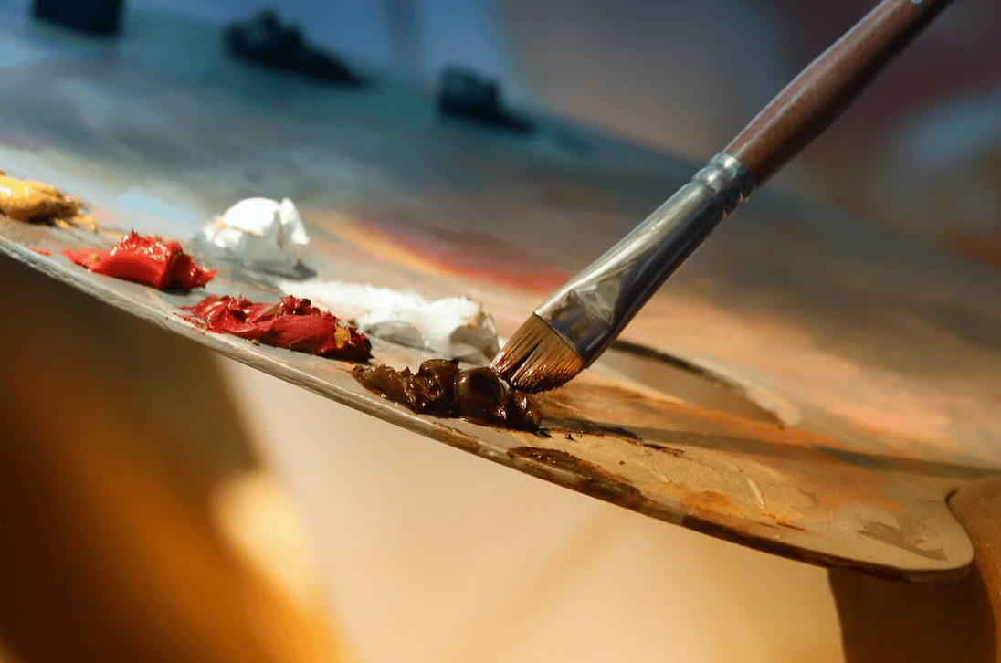 paints on a palette, painting picture