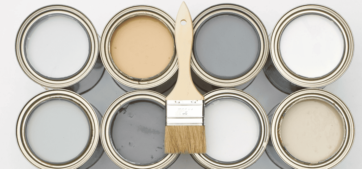 jars of chalk paint, with a brush on top